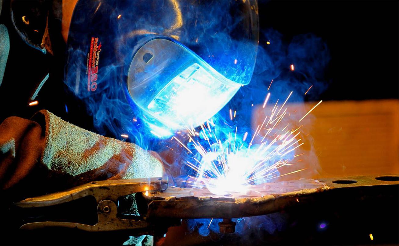 Photo of a student welding